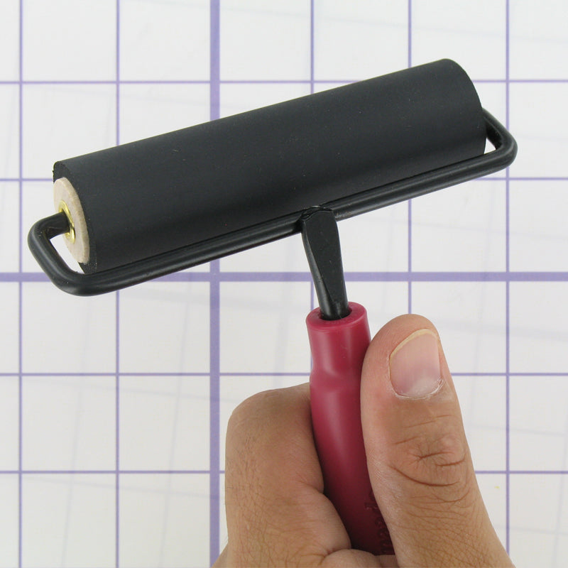 Speedball Roller Applicator Gripped by Hand