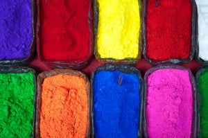 In sign making, what is the difference between spot and process color?