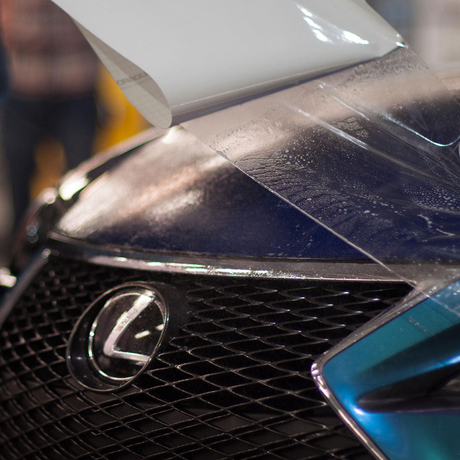 Application of overlaminate film over a vehicle as a paint protection film.