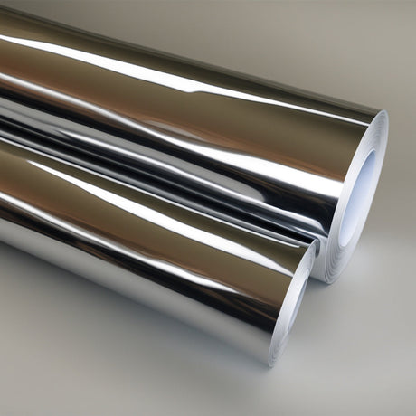 Chrome metallic vinyl rolls laying on their side