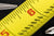 Close up of yellow ruler alignment tool.