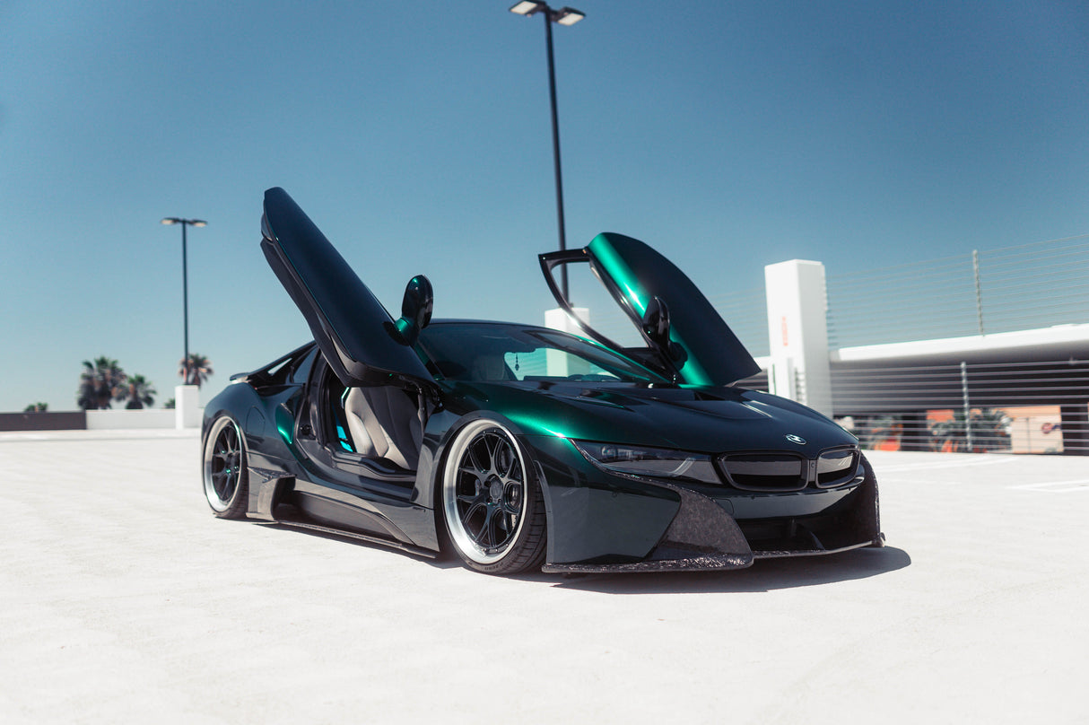 KPMF K75000 Series Premium Iridescent Wrapping Cast Vinyl Green Black Iridescent wrapped sports car with open doors on a clear day