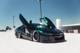 KPMF K75000 Series Premium Iridescent Wrapping Cast Vinyl Green Black Iridescent wrapped sports car with open doors on a clear day