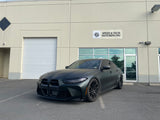 KPMF K75000 Series Premium Iridescent Wrapping Cast Vinyl Matte Platinum Dark Sage wrapped BMW car parked in front of a building with 'Speed & Tech Motoring Inc.' sign.
