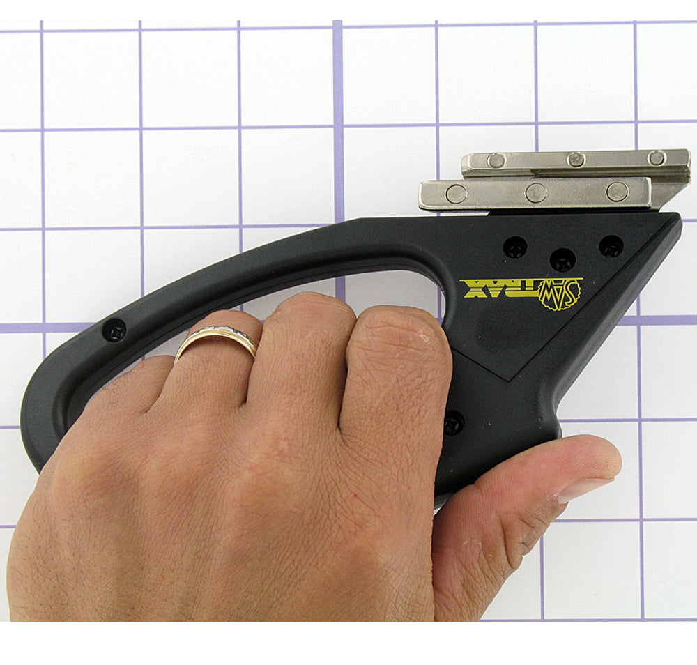 Saw Trax Coro-Claw X - 10 mil Coroplast Cutter in hand